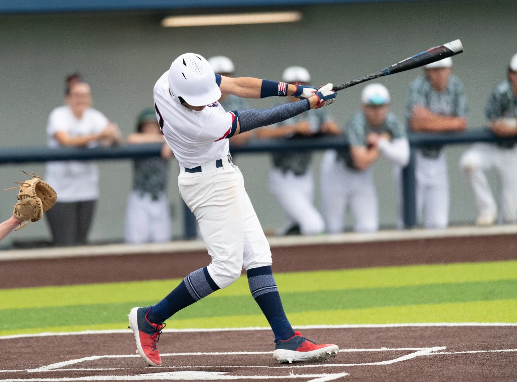 Youth baseball player working on hitting mechanics during a private lesson